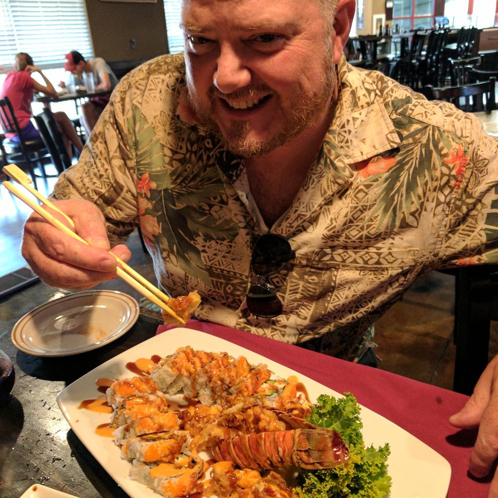 mike having sushi.jpg