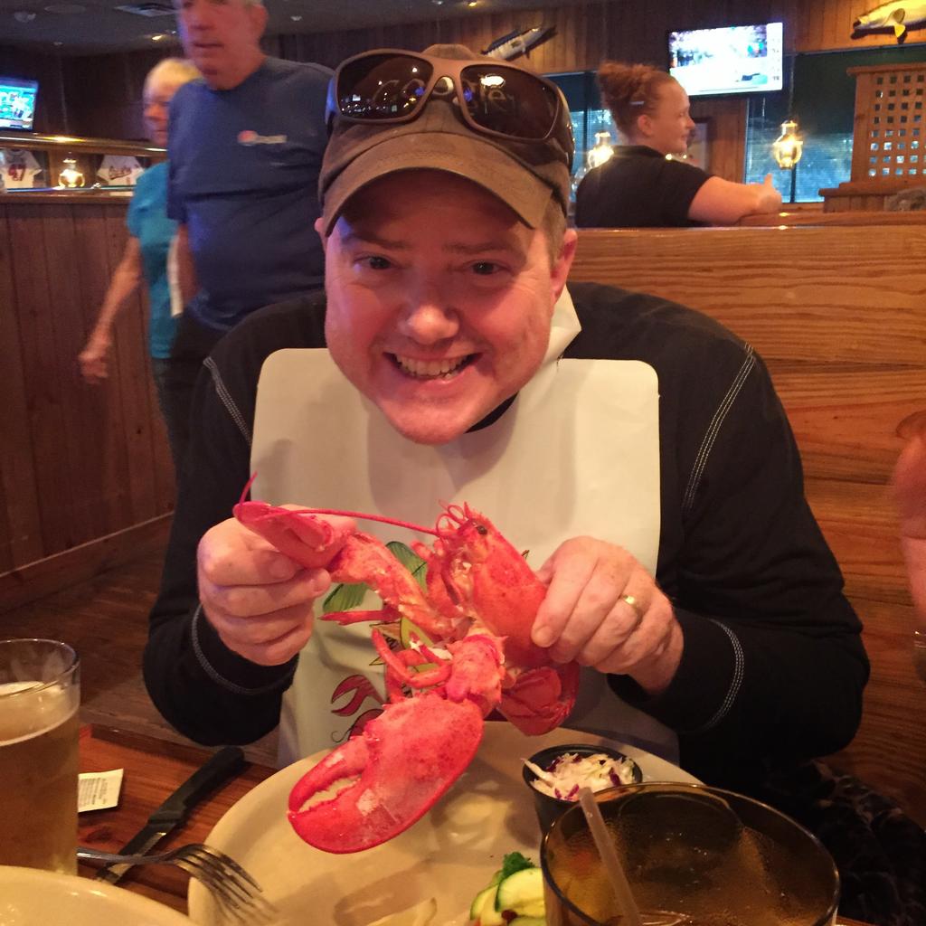 mike tackling a lobster.jpg